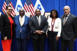 USDOT Office of Civil Rights Director Irene Marion, USDOT Office of Small and Disadvantaged Business Utilization Director Brad Mims, Richmond International Airport President &amp; CEO Perry Little, AMAC President &amp; CEO Eboni Wimbush, and Louis Armstrong New Orleans International Director of Aviation Kevin Dolliole attend the USDOT announcement of the new DBE Program Final Rule at the USDOT Headquarters Building on April 9, 2024, in Washington, D.C. (L-R)